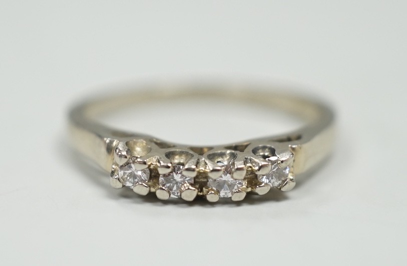 A Canadian Birks 18k white metal and four stone diamond set ring, size I, gross weight 1.8 grams.